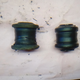 LEFT: old control arm bushing RIGHT: new control arm bushing